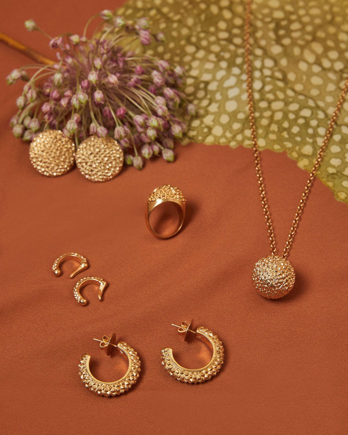 Piercing jaca prata banho de ouro amarelo